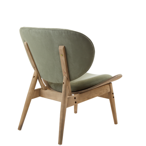 A modern green velvet chair with a grey elm wood frame and angled legs perfect for stylish lounging