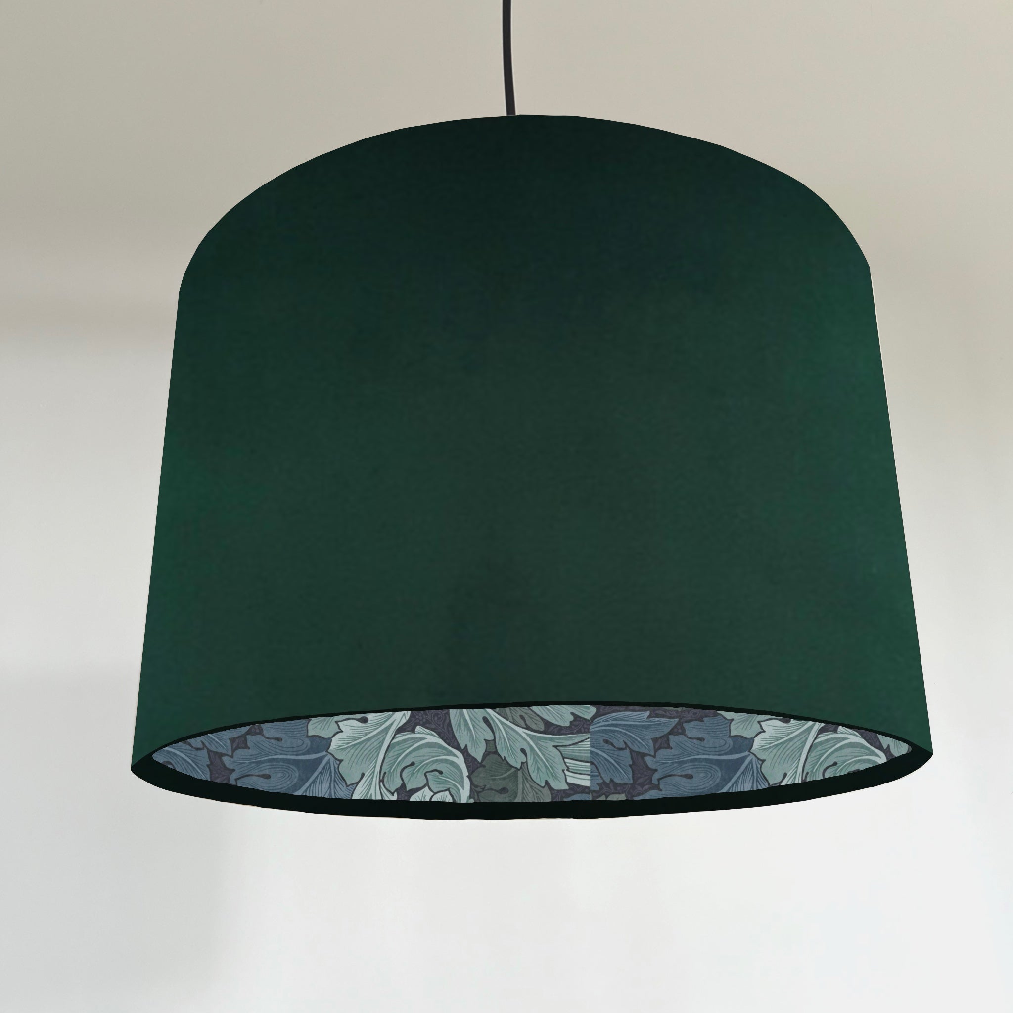 Green velvet drum lampshade 30cm height with blue leaves paper interior and intricate leaf pattern lining