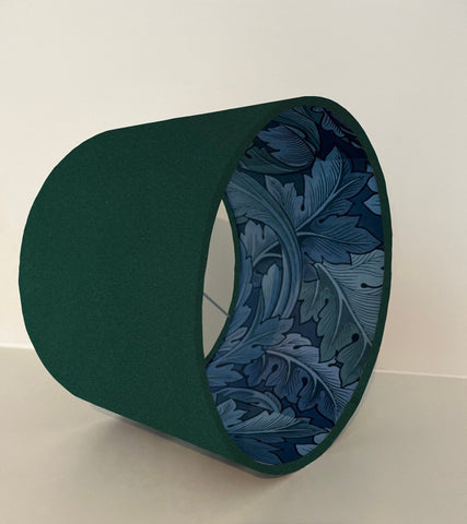 Green velvet drum lampshade 30cm height with dark green exterior and intricate blue leaves paper interior lining