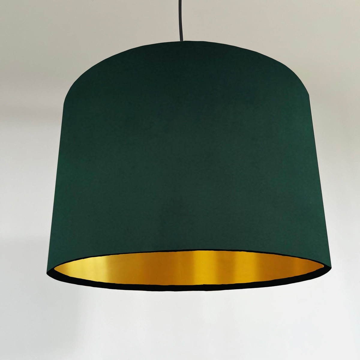 Deep green plain velvet ceiling shade with metallic brushed gold lining and 30cm height pendant lamp
