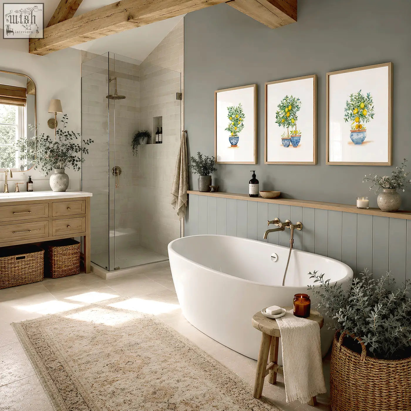White freestanding bathtub with curved design and polished finish next to green wall art lemon tree prints set of 3