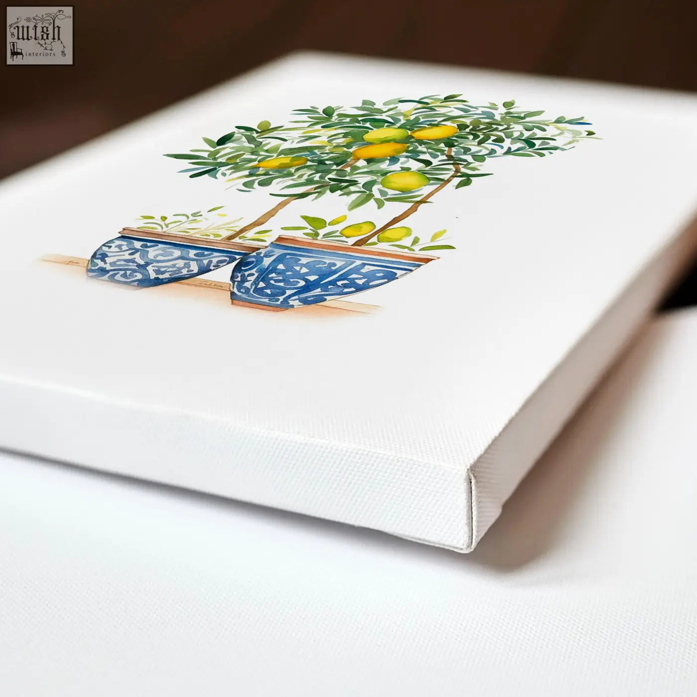 White canvas wall art featuring watercolor lemon tree illustrations in blue and white pots perfect for green wall art