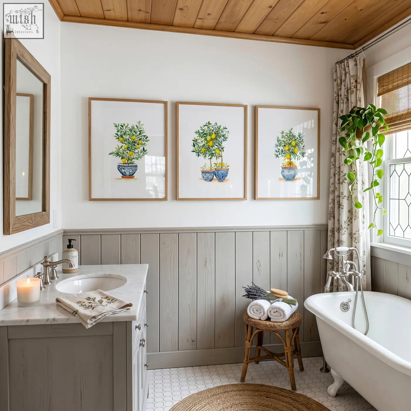 Three framed green wall art prints featuring lemon tree illustrations in blue ceramic pots with light wood frames