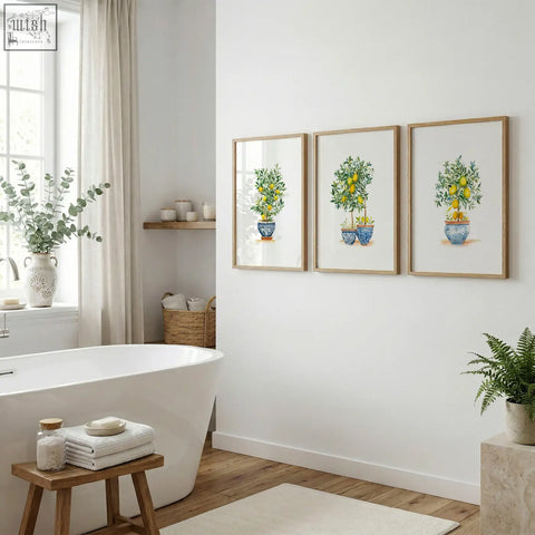 Set of 3 green wall art prints featuring lemon tree illustrations in blue ceramic pots with light wood frames