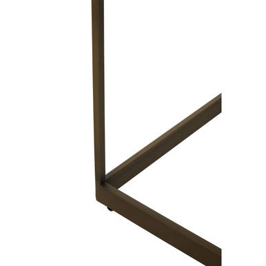 Dark brown metal frame with clean lines forming a corner on a brushed brass coffee table with oak veneer top