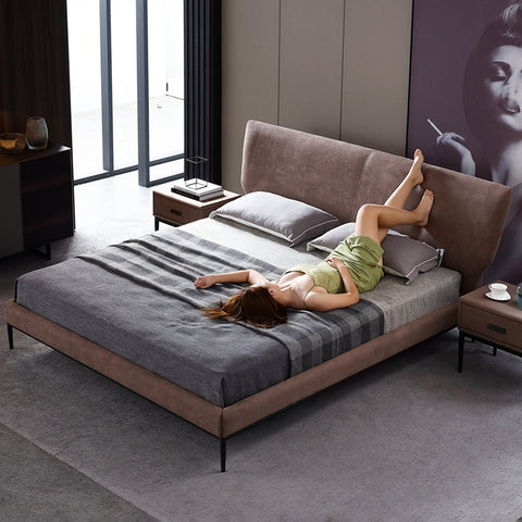 Modern taupe upholstered greta king size and super king size bed with sleek minimalist design and matching gray bedding