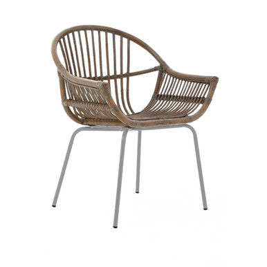 Grey wash natural rattan armchair with curved back and seat on slender silver metal legs for stylish seating