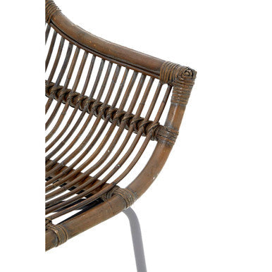 Brown woven grey wash natural rattan chair with curved backrest and metal frame perfect for indoor seating