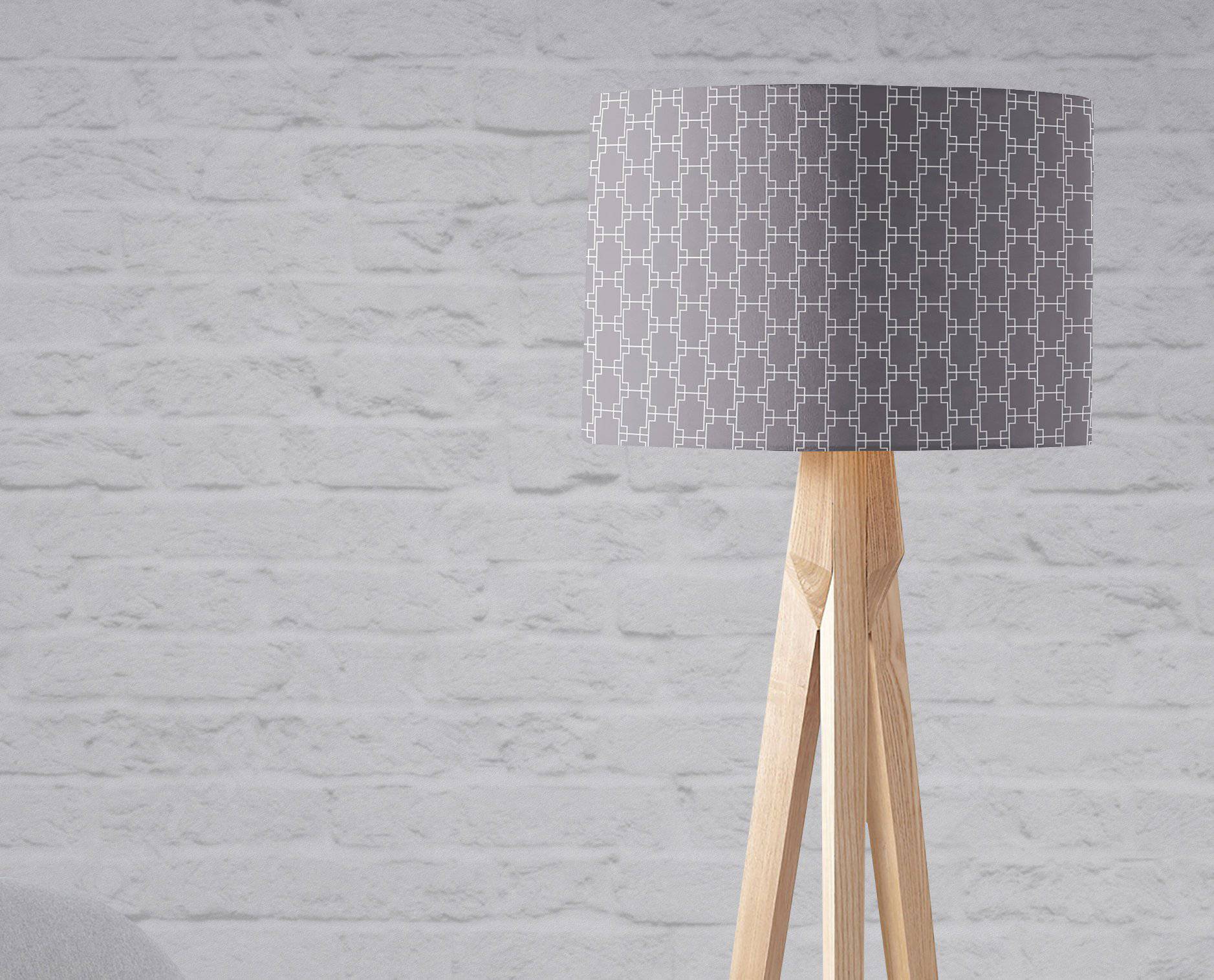 Gray gradient table lamp with white squares geometric design and light wood tripod base inch diameter shade