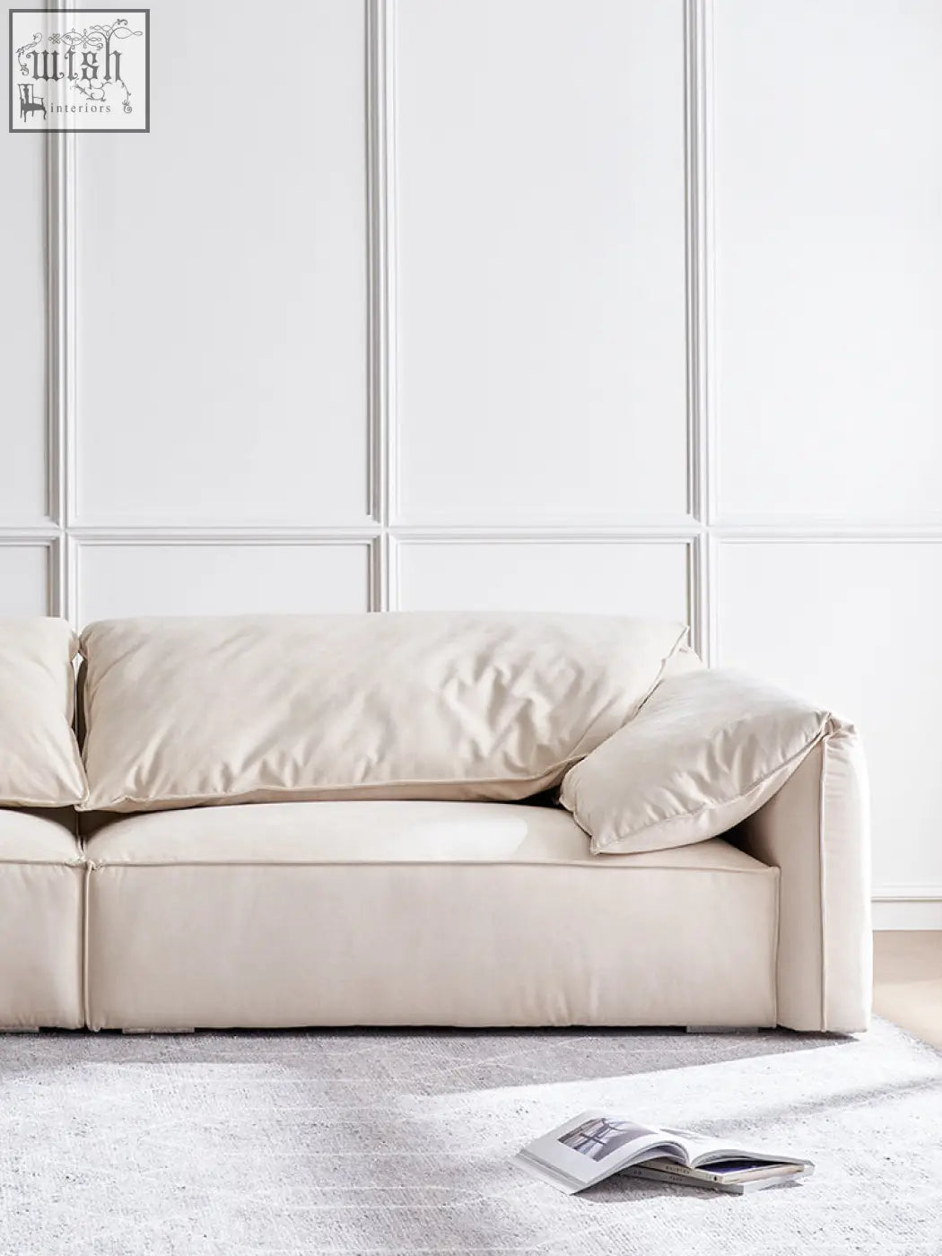 Cream-colored grimm velvet sofa with plush cushions and clean modern lines seamlessly blends style and comfort
