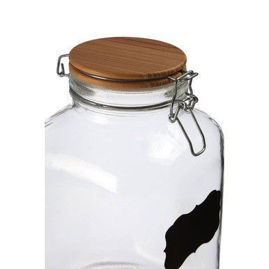 Clear glass storage jar with wooden lid and metal clasp featuring black abstract design for grocer glass storage