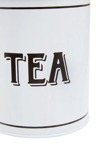 White metal tea canister with black tea lettering and thin horizontal lines perfect for storing loose leaf tea