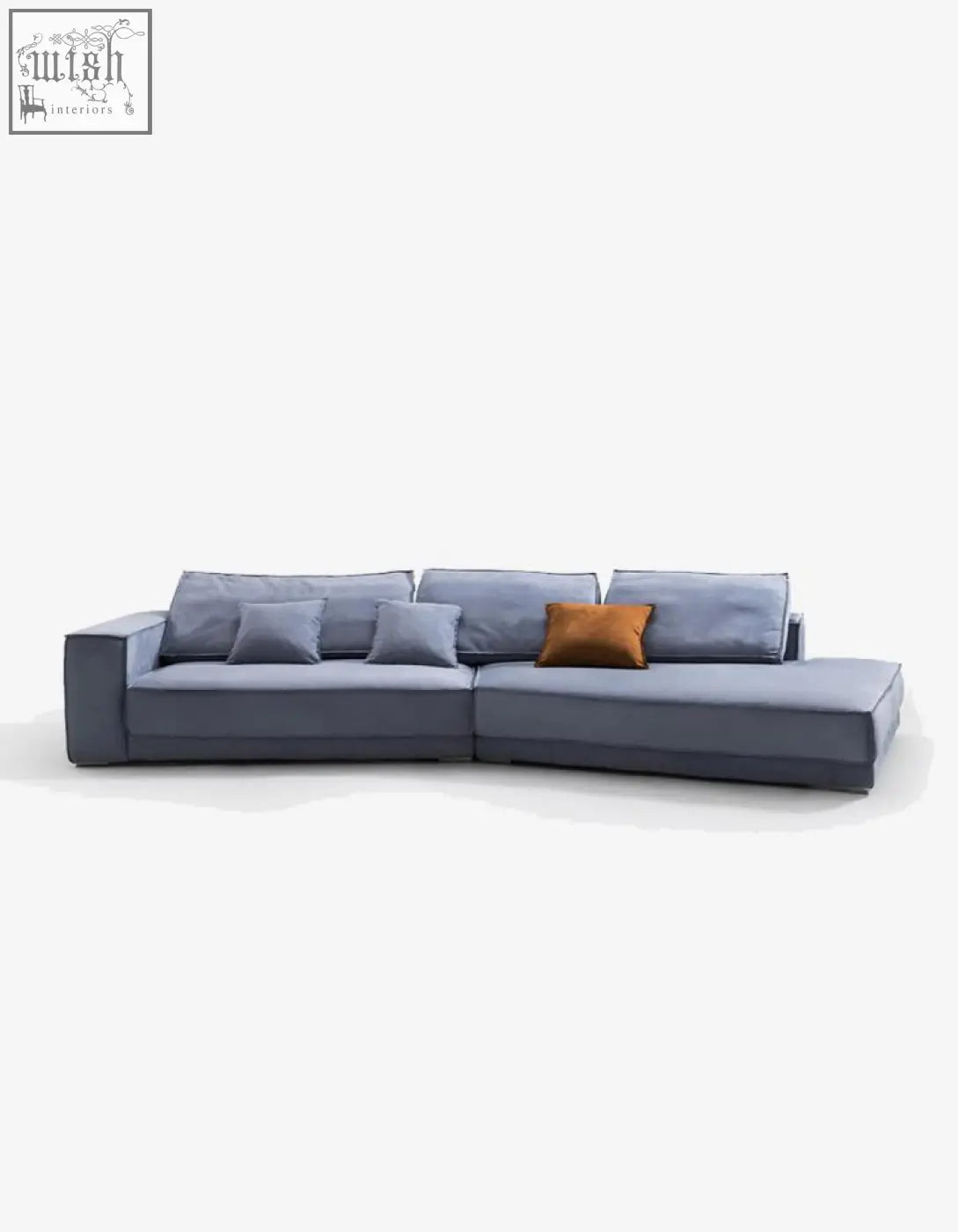 Modern gray grover three seater sofa in suedue with a sleek design and warm orange accent pillow perfect as a corner sofa