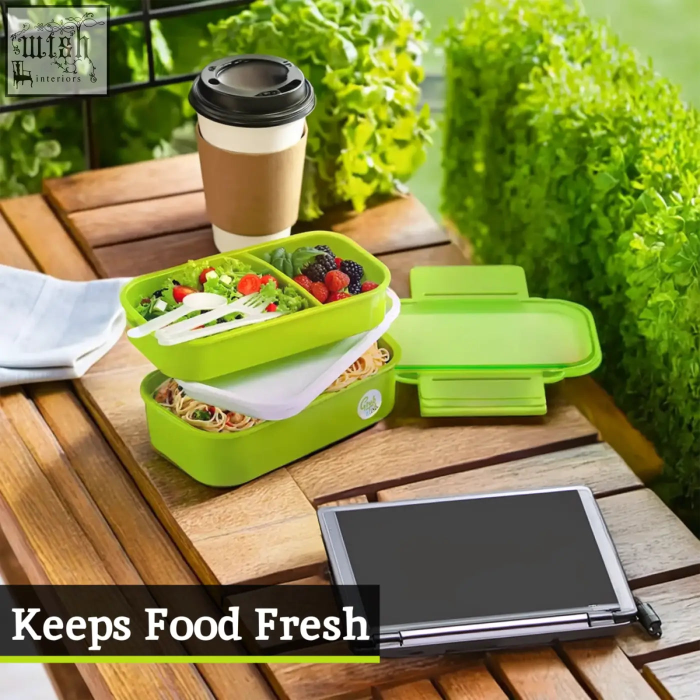 Bright green two-tiered grub tub green lunch box with airtight lid and compartments for salads and pasta