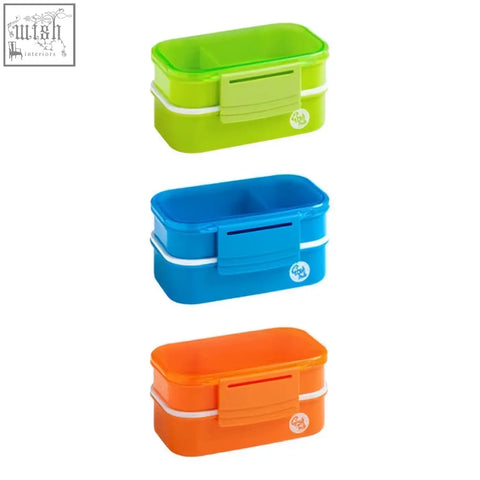 Brightly colored two tiered plastic grub tub green lunch box with cutlery in lime green blue and orange with white trim