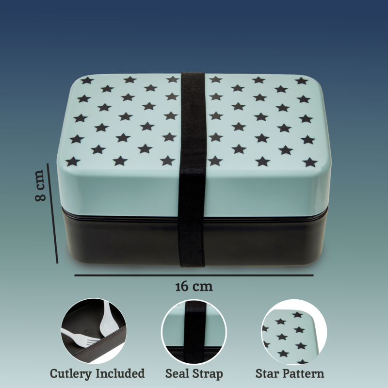A grub tub light blue star lunch box with a mint green top and dark brown base secured by a black seal strap
