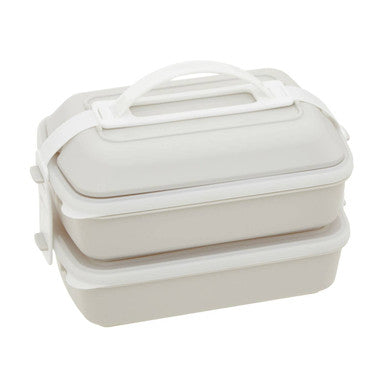 White three-tiered grub tub lunch box in warm grey and white with integrated handle and matching lid