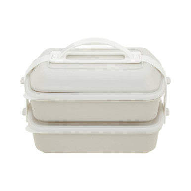 White three-tiered grub tub lunch box with warm grey lid and integrated handle for easy carrying