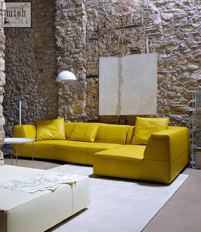 Vibrant yellow guzman velvet corner sofa with plush cushions and clean modern lines in leather upholstery