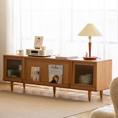 Light oak wood gwendolyn rattan tv stand with glass-paneled doors and tapered legs for stylish media storage