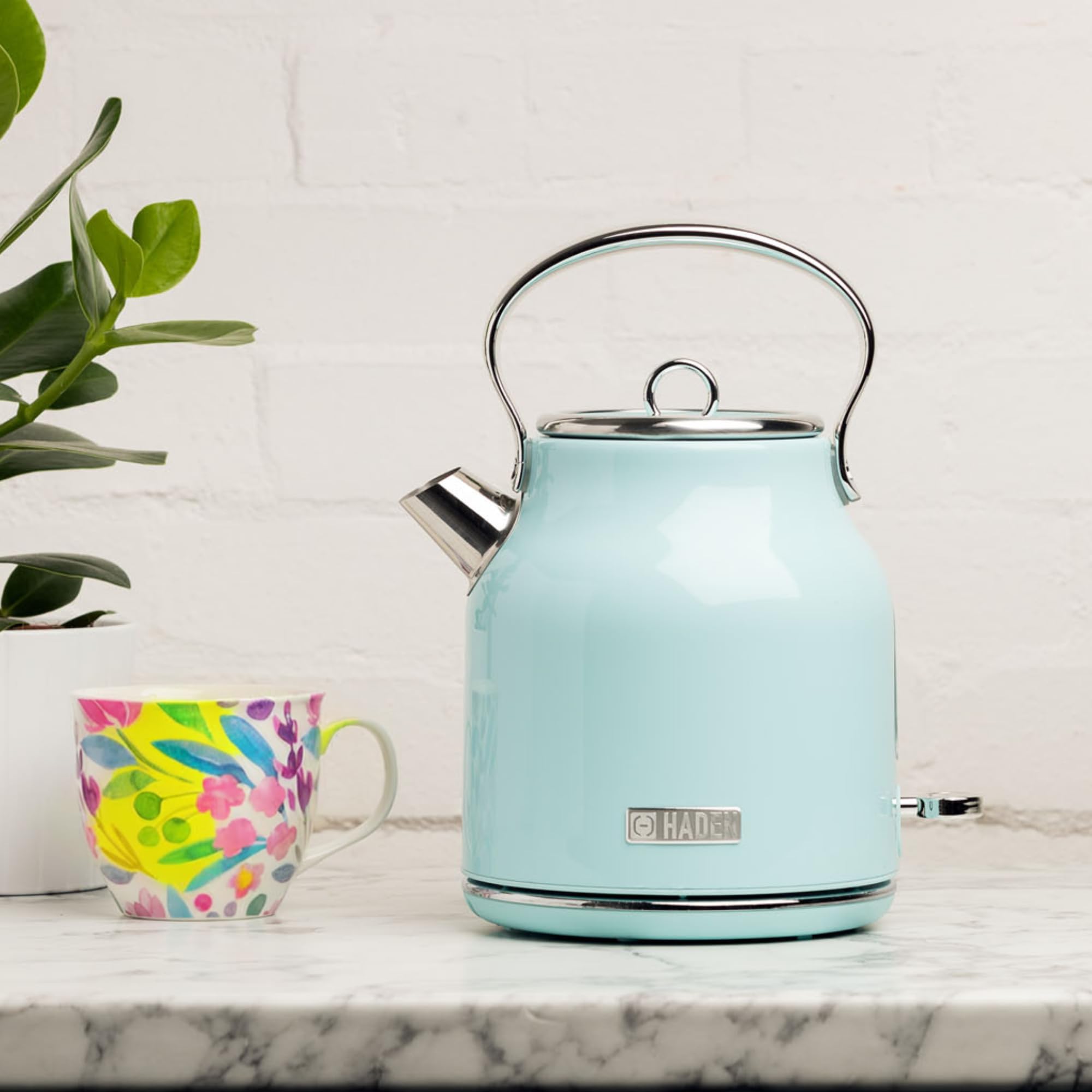 A sleek pastel blue haden heritage retro kettle with stainless steel housing rapid boil and chrome details