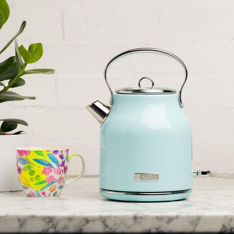 A sleek pastel blue haden heritage retro kettle with stainless steel housing rapid boil and chrome details