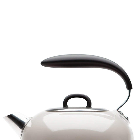 Cream-colored stainless steel haden jersey kettle with rapid boil technology safety features and sleek black handle