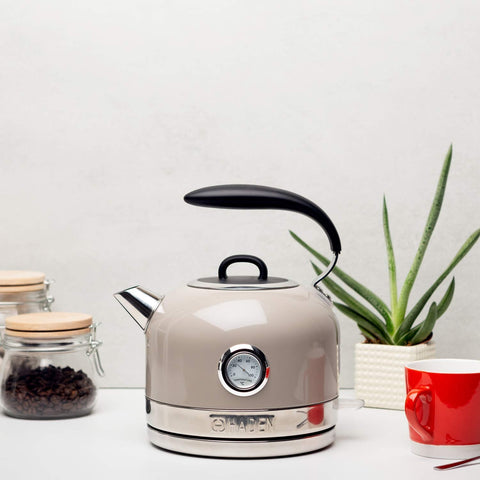 Beige ceramic haden jersey kettle with stainless steel base rapid boil technology and safety features in putty color