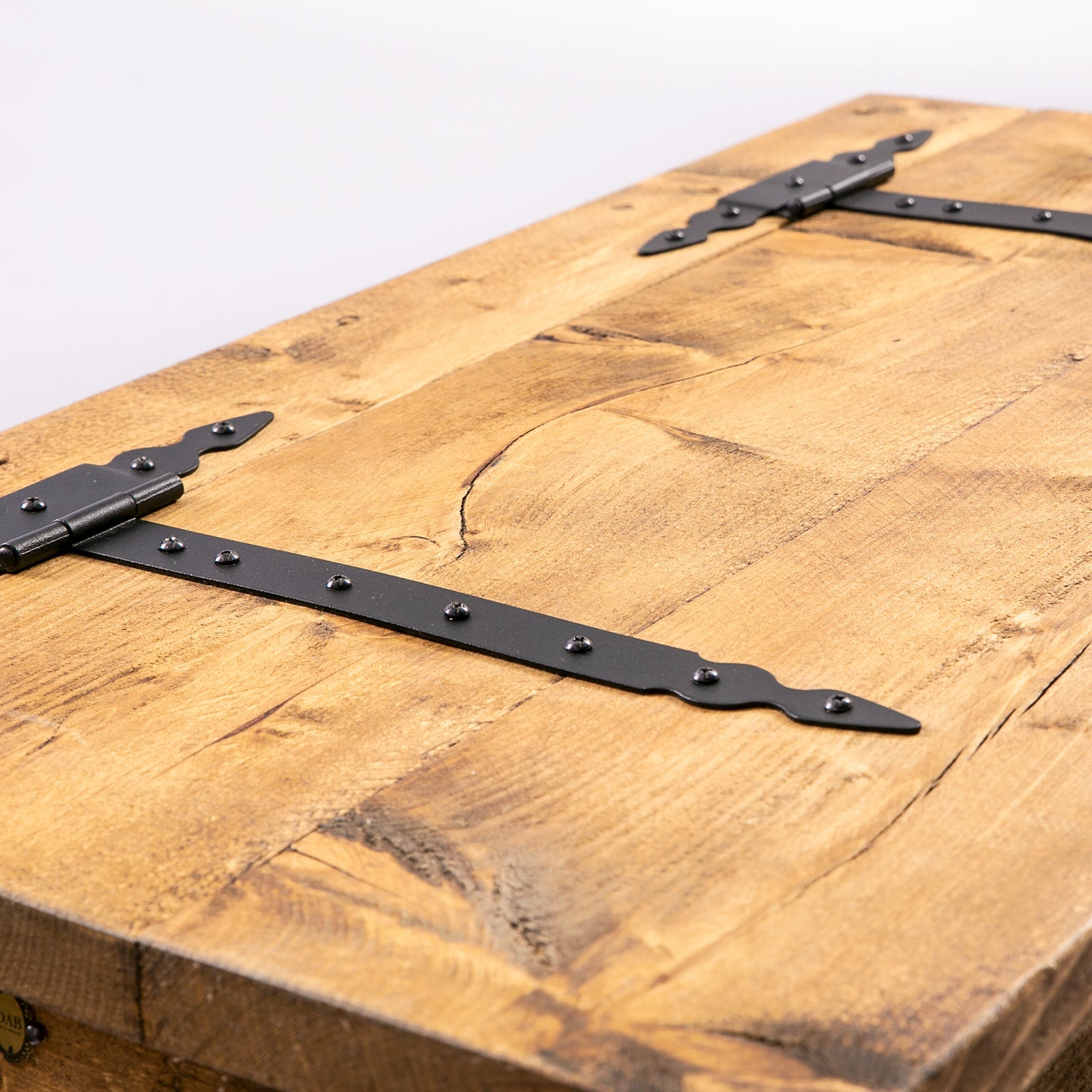 Rustic wooden blanket box trunk with black metal hinges and decorative studs for hairpin storage