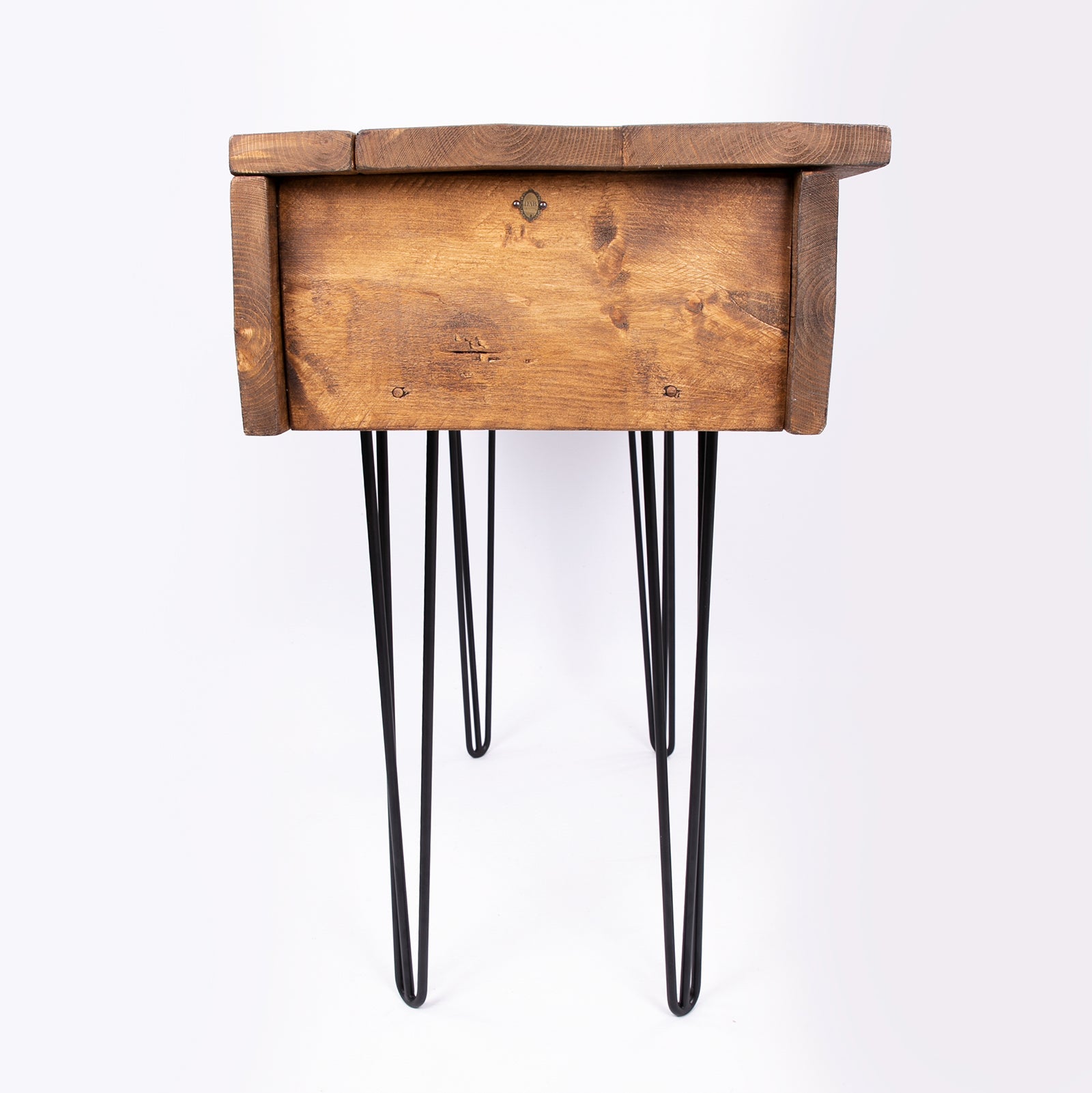 Rustic wooden blanket box with black hairpin legs used as a wooden blanket storage chest trunk