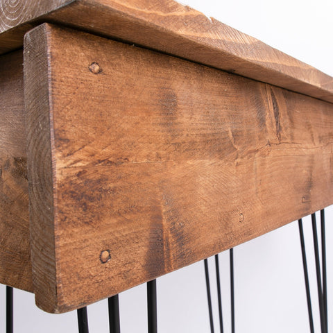 Rustic brown wooden blanket box with visible grain and nail head details perfect for hairpin storage