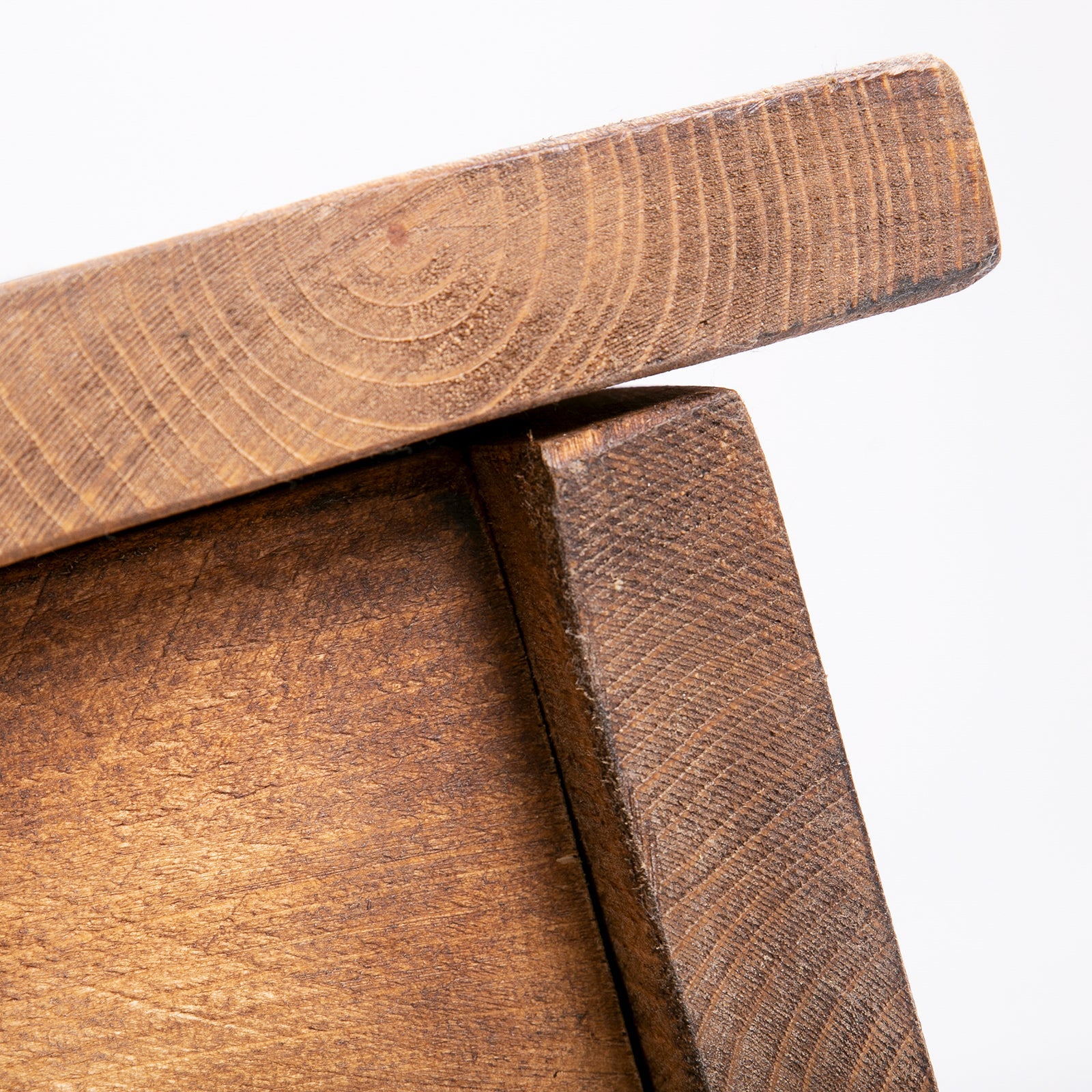 A rustic dark brown wooden blanket box trunk with visible grain and a worn finish for hairpin storage