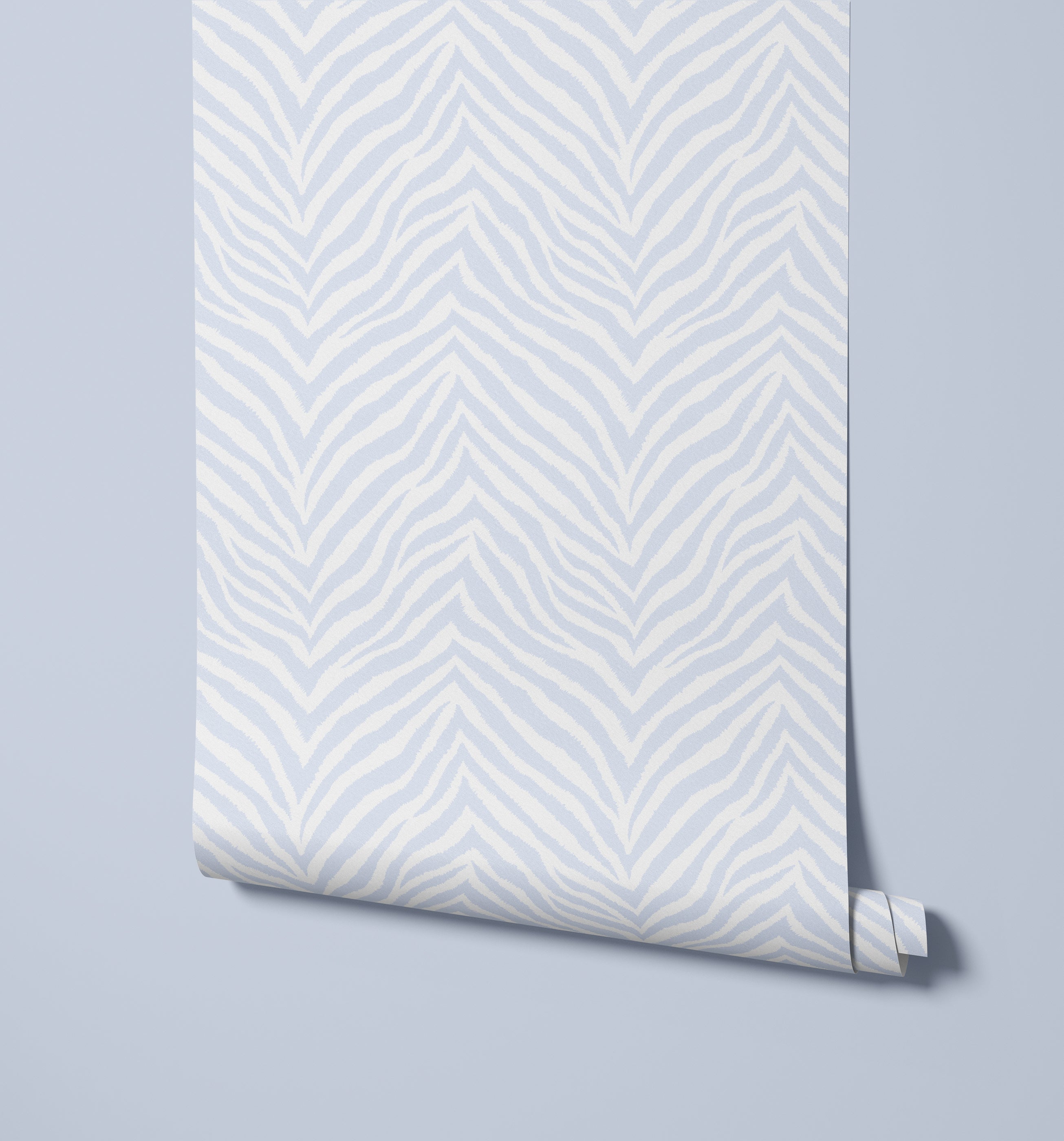 A roll of hakambo white and gray zebra print wallpaper with a chevron pattern perfect for stylish walls