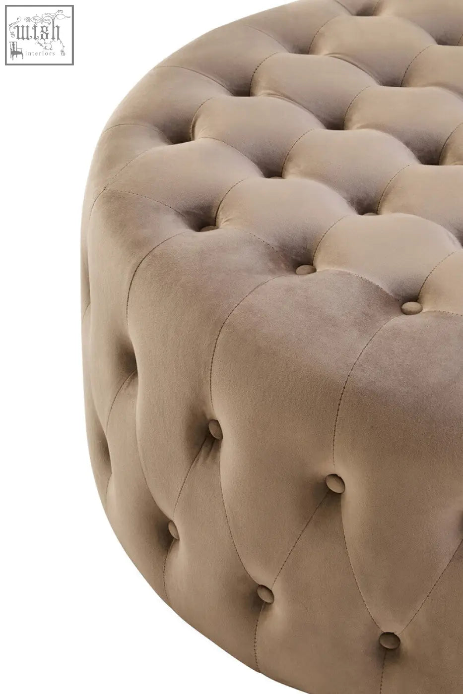 Beige mink velvet round tufted footstool with button detailing perfect for cozy living spaces