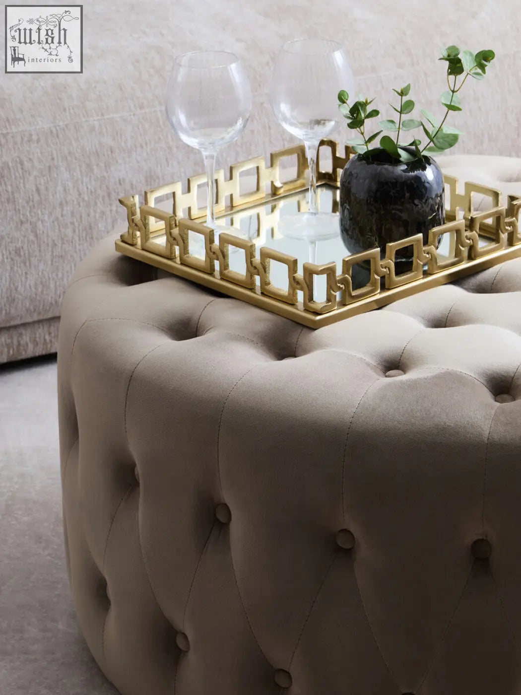Beige mink velvet round tufted ottoman with gold framed mirrored tray perfect for stylish footrest or decor