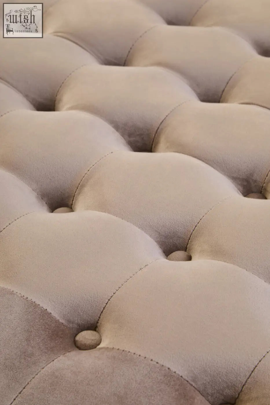 Haley mink velvet round tufted footstool with beige velvet round tufted upholstery and button details