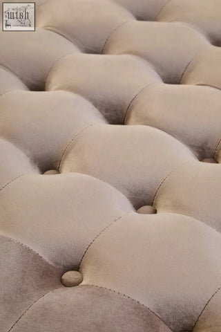Haley mink velvet round tufted footstool with beige velvet round tufted upholstery and button details