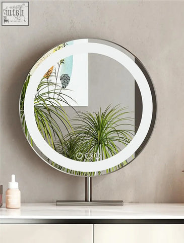 Hamlin dressing table with sintered stone and a circular vanity mirror with illuminated led ring and metallic stand