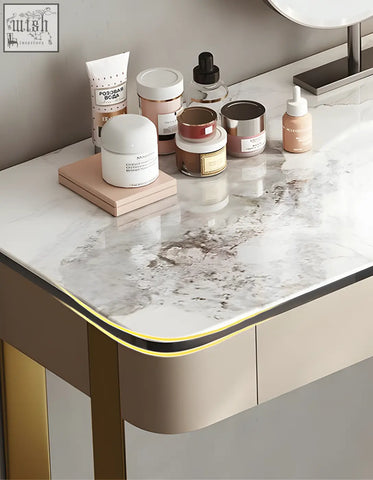 Hamlin dressing table with mirror featuring a white marble-effect sintered stone tabletop with gold trim and shipping cost info
