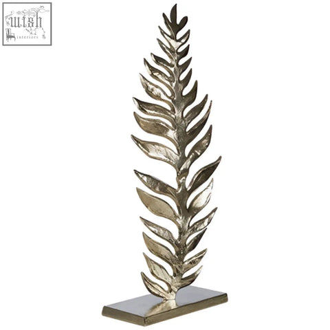 Silver rough nickel leaf sculpture with layered fern design on rectangular base called hampstead leaf sculpture