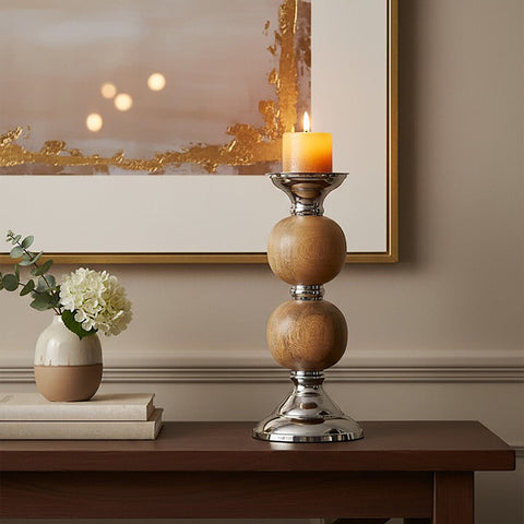 Hampstead medium pillar candle holder with polished silver base and warm honey wooden spheres for medium pillar candle use
