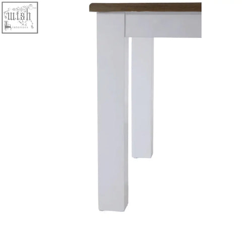 White dining table leg painted with hampstead oak dark wood tabletop in a stylish dining table design