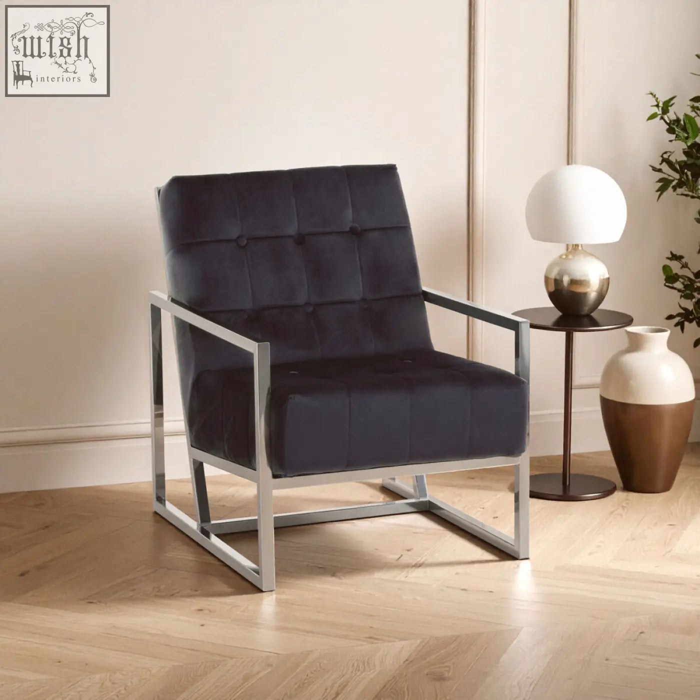 Hana black velvet chair with tufted velvet upholstery and a sleek stainless steel frame for modern style