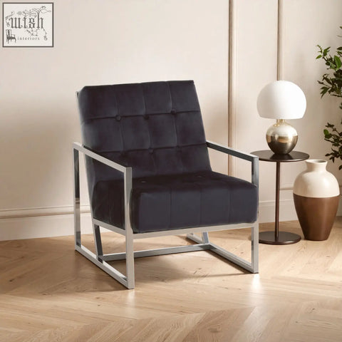 Hana black velvet chair with tufted velvet upholstery and a sleek stainless steel frame for modern style
