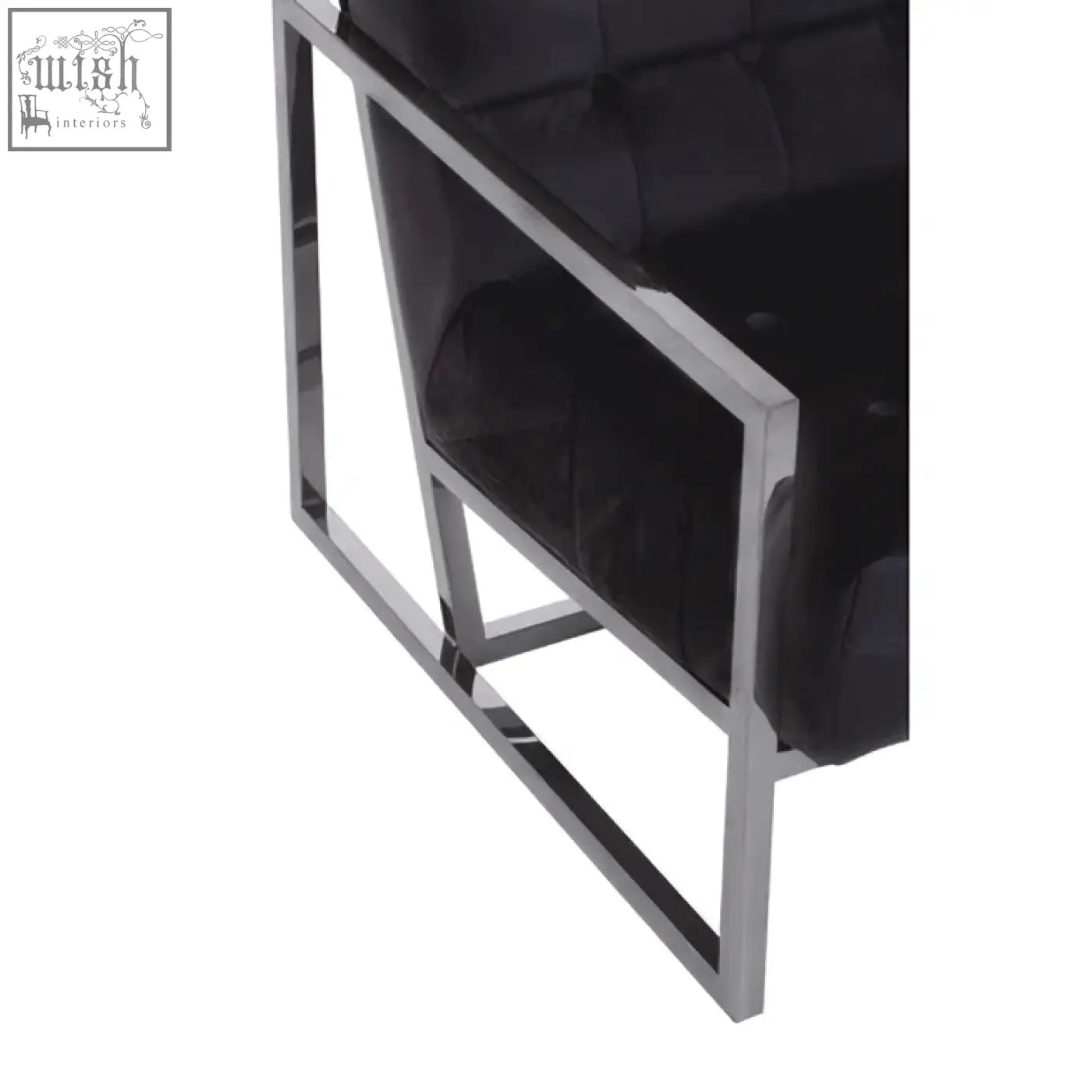Black tufted velvet chair with a sleek chrome stainless steel frame perfect for stylish modern seating