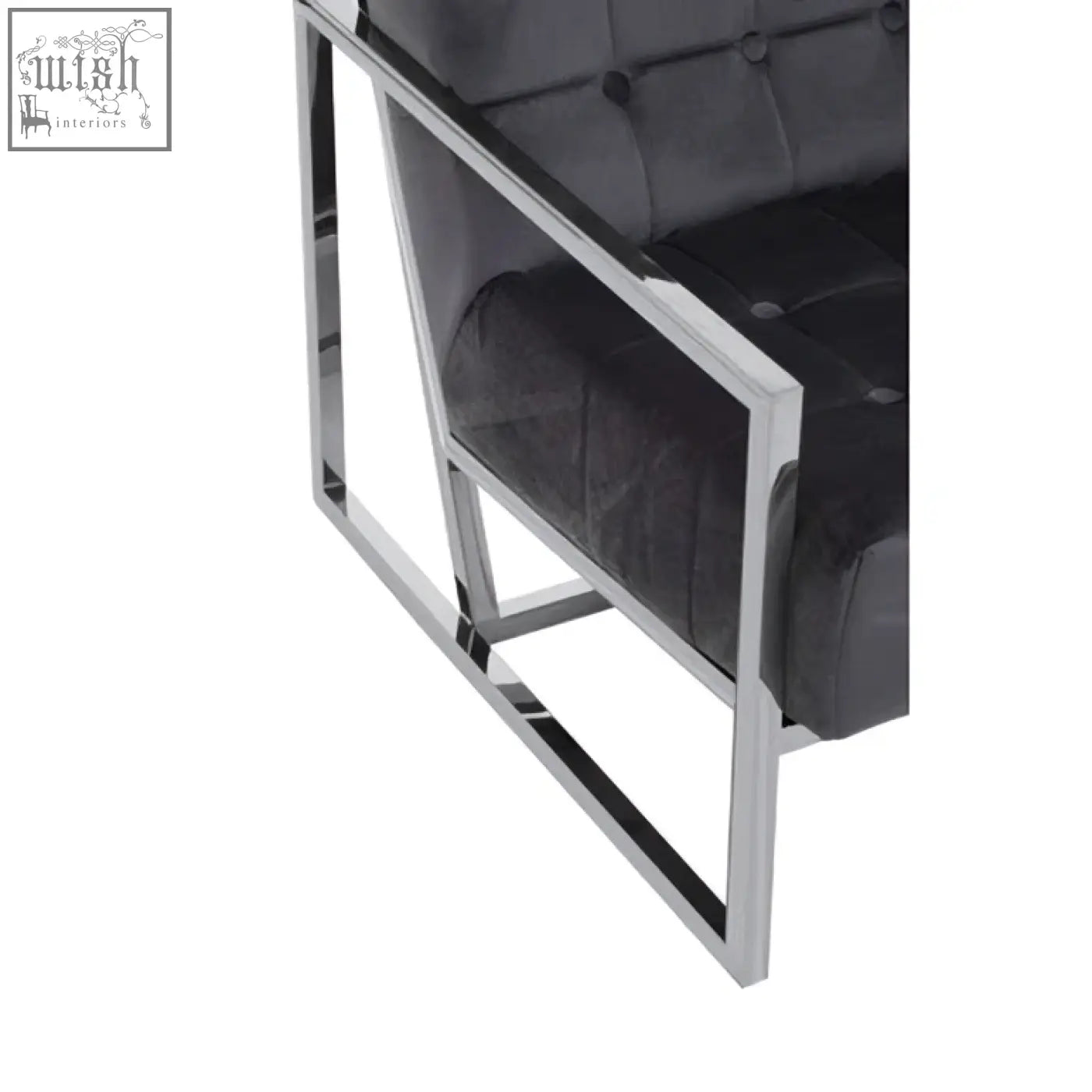 Black tufted leather armchair with a sleek stainless steel frame perfect for stylish modern seating