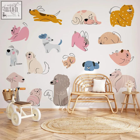 Woven rattan bench with white cushion next to hand drawn dogs nursery wall decals for cute baby room decor