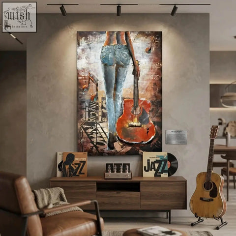 Handcrafted woman with guitar back view 3d metal wall art featuring blue jeans and orange guitar for living room decor