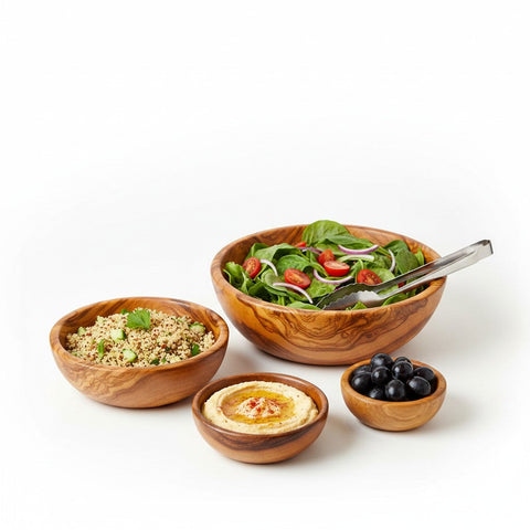 Set of four handmade olive wood bowls with silky polished interior featuring natural grain for salad and serving use