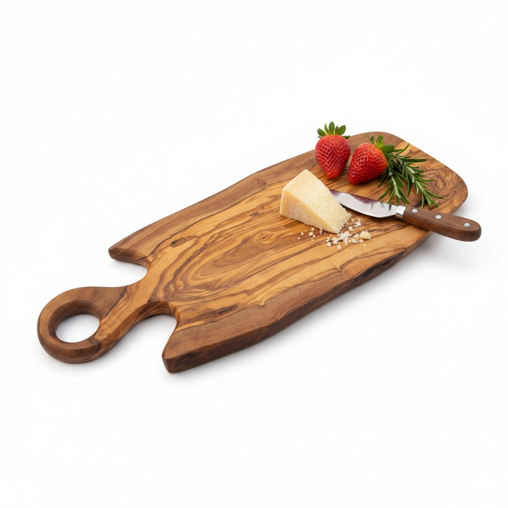 Handmade olive wood freeform serving board with natural finish and round loop handle for cheese and charcuterie